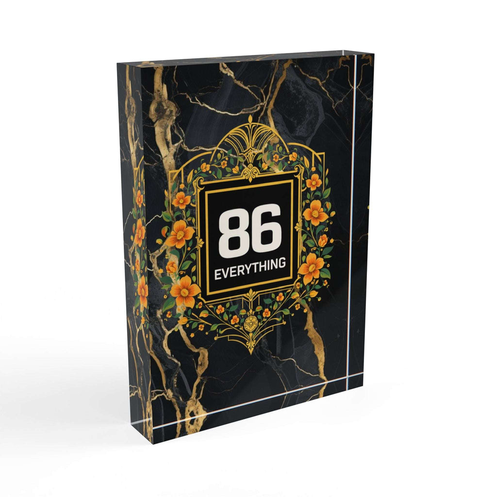 Rectangular black marble pattern acrylic block with gold floral frame and 86 EVERYTHING printed in the center.
