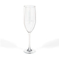 Single clear glass champagne flute with SALUTÉ and 86 EVERYTHING printed on the side.