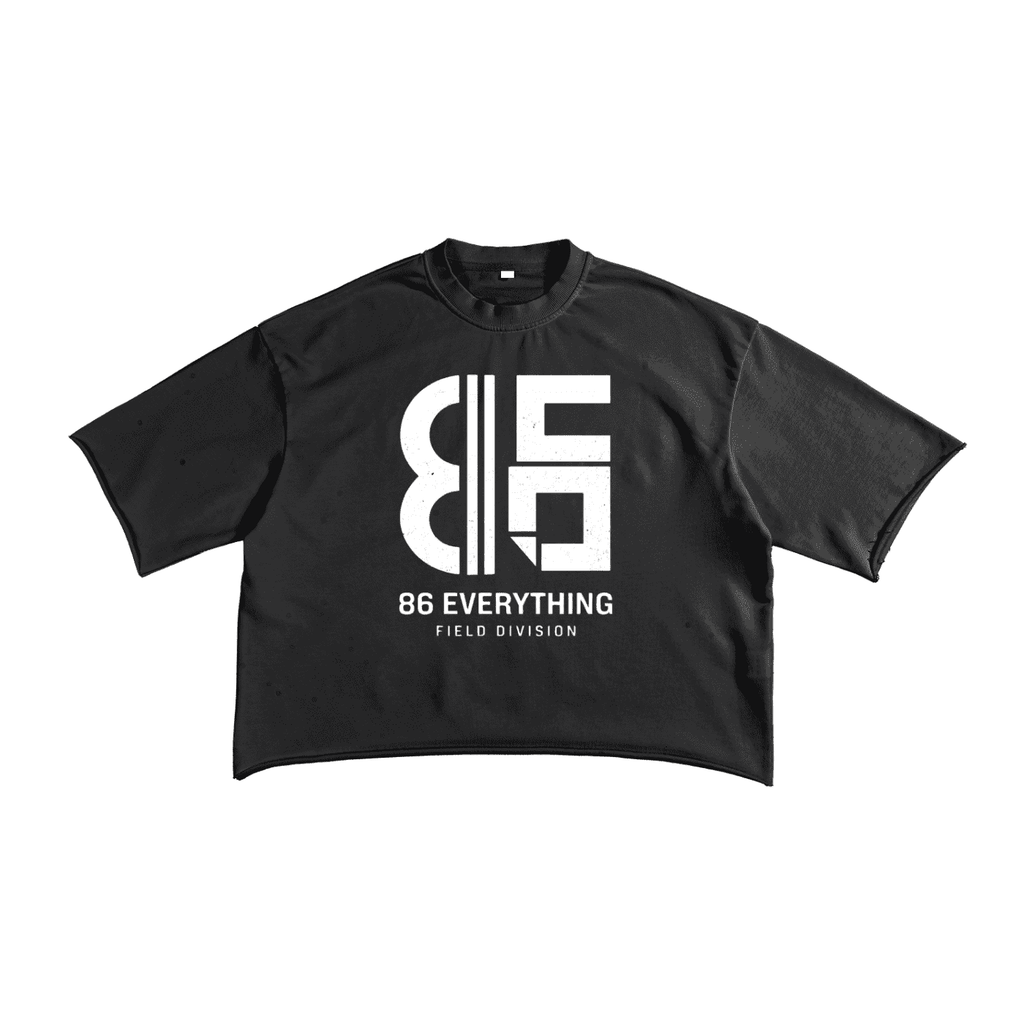 Black short sleeve raw edge t-shirt with a white 86 EVERYTHING FIELD DIVISION logo printed on the chest.