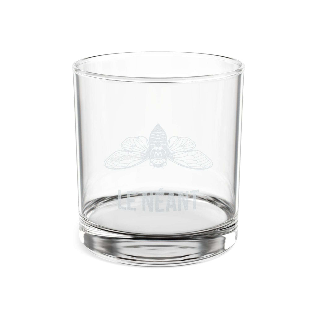 One clear glass whiskey glass with a moth illustration and LE NÉANT printed on the side.
