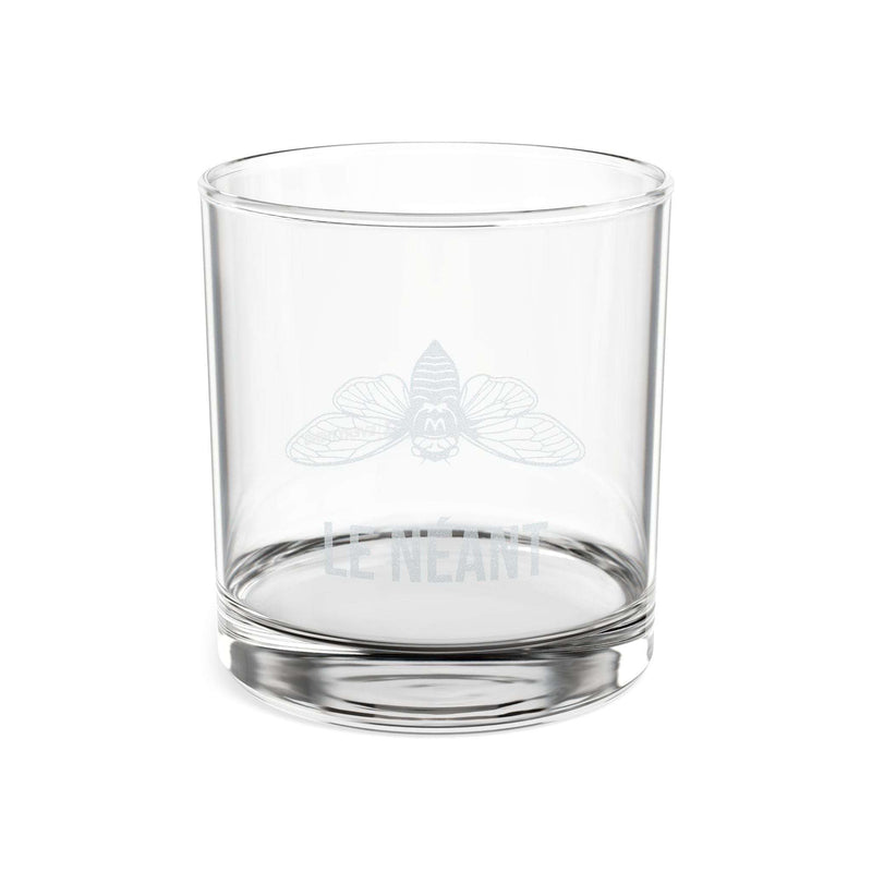 One clear glass whiskey glass with a moth illustration and LE NÉANT printed on the side.